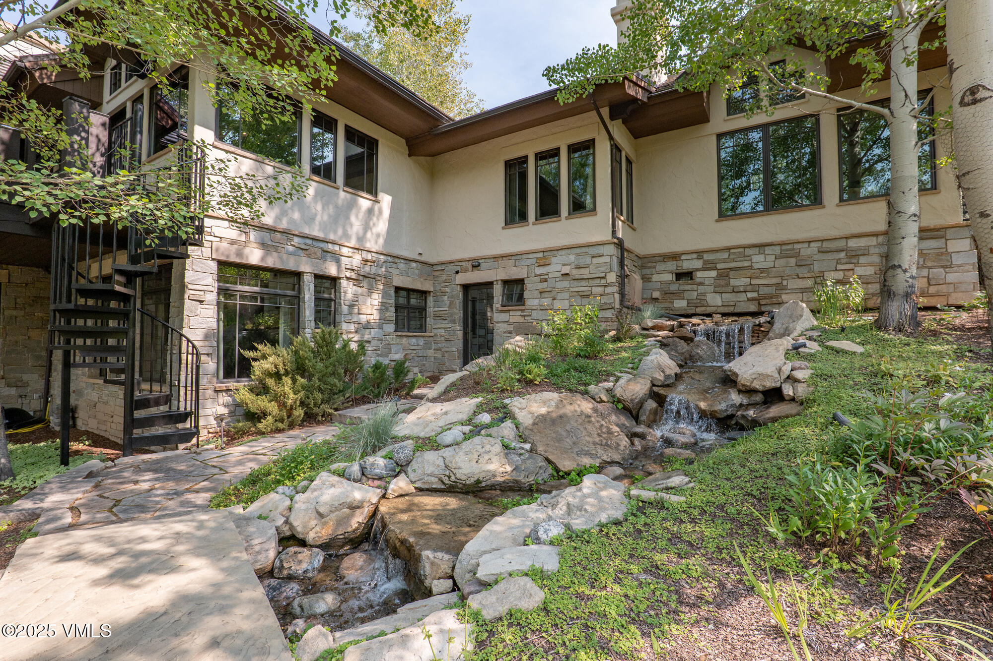 135 Andorra Road Edwards, CO 81632 - Photo 58 of 82 a view of a house with yard and sitting area