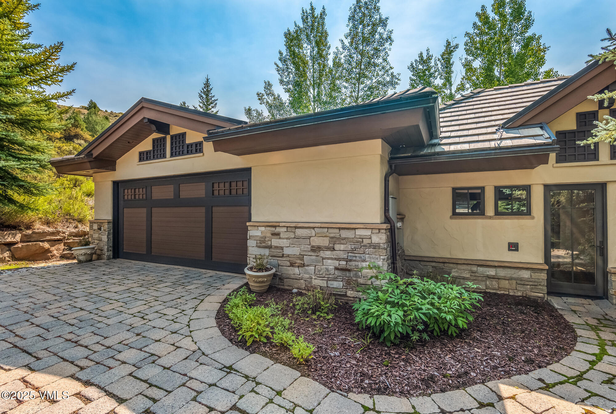135 Andorra Road Edwards, CO 81632 - Photo 62 of 82 a front view of a house with garden
