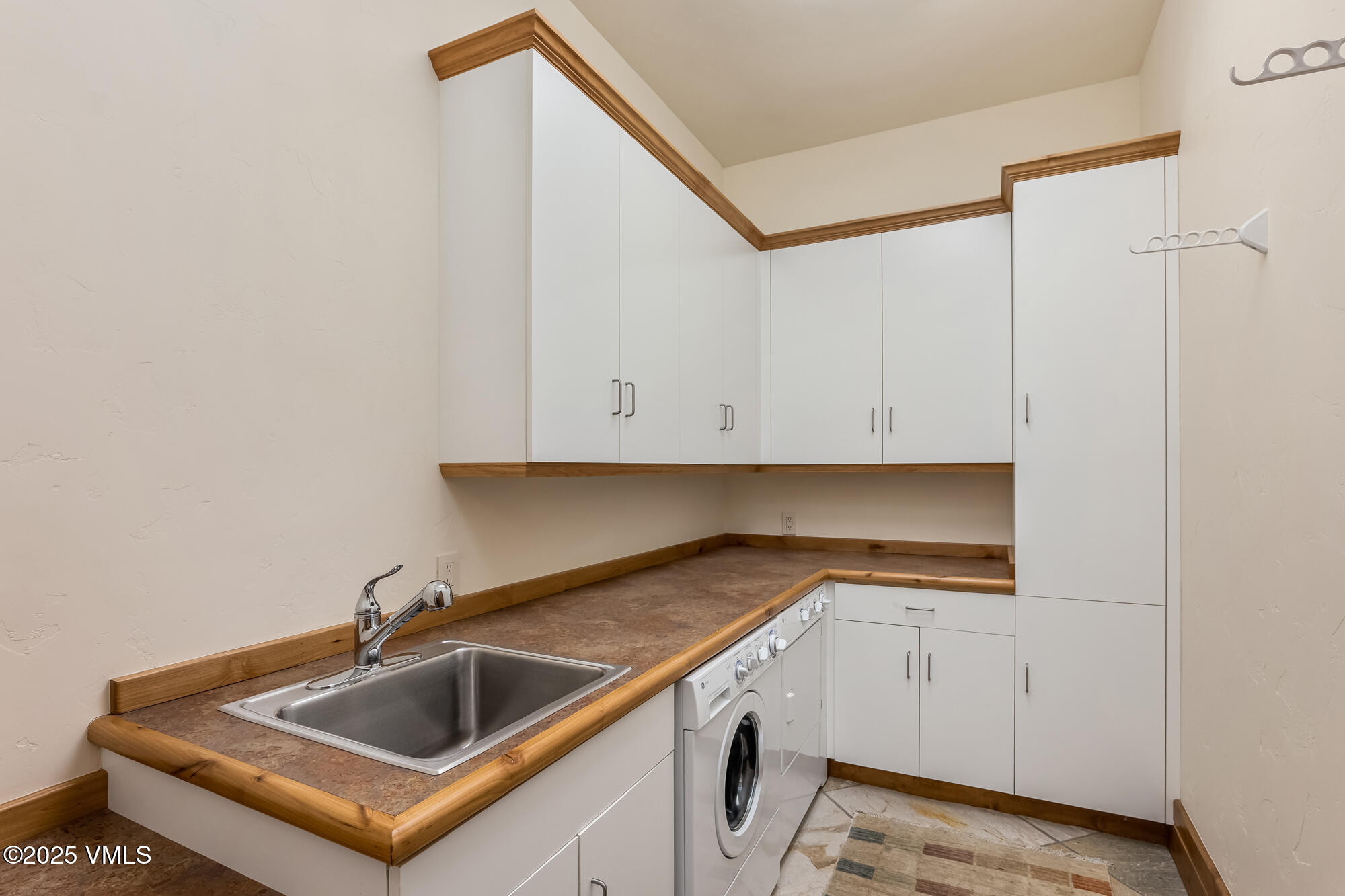 135 Andorra Road Edwards, CO 81632 - Photo 77 of 82 a kitchen with a sink and cabinets