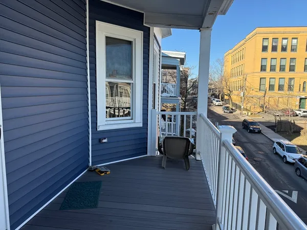 a view of a furniture and workspace with wooden floor
