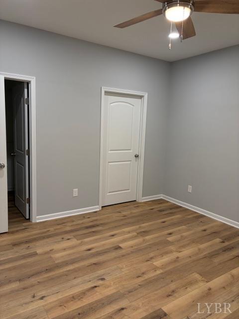 5461 Bear Creek Road Rustburg, VA 24588 - Photo 25 of 27 a view of an empty room with wooden floor