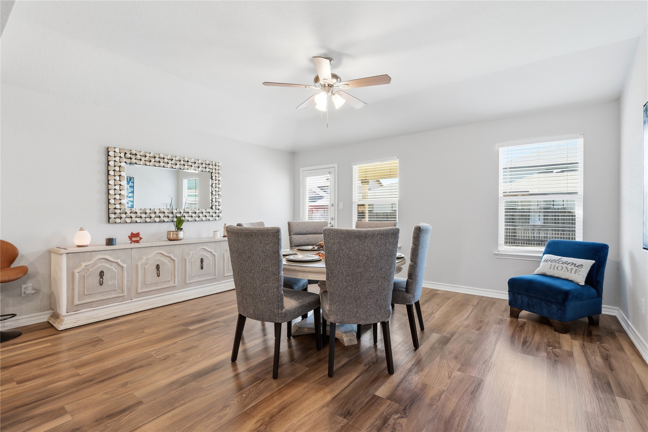 2811 Davis Trace San Antonio, TX 78245 - Photo 14 of 31 a view of a dining room with furniture and wooden floor