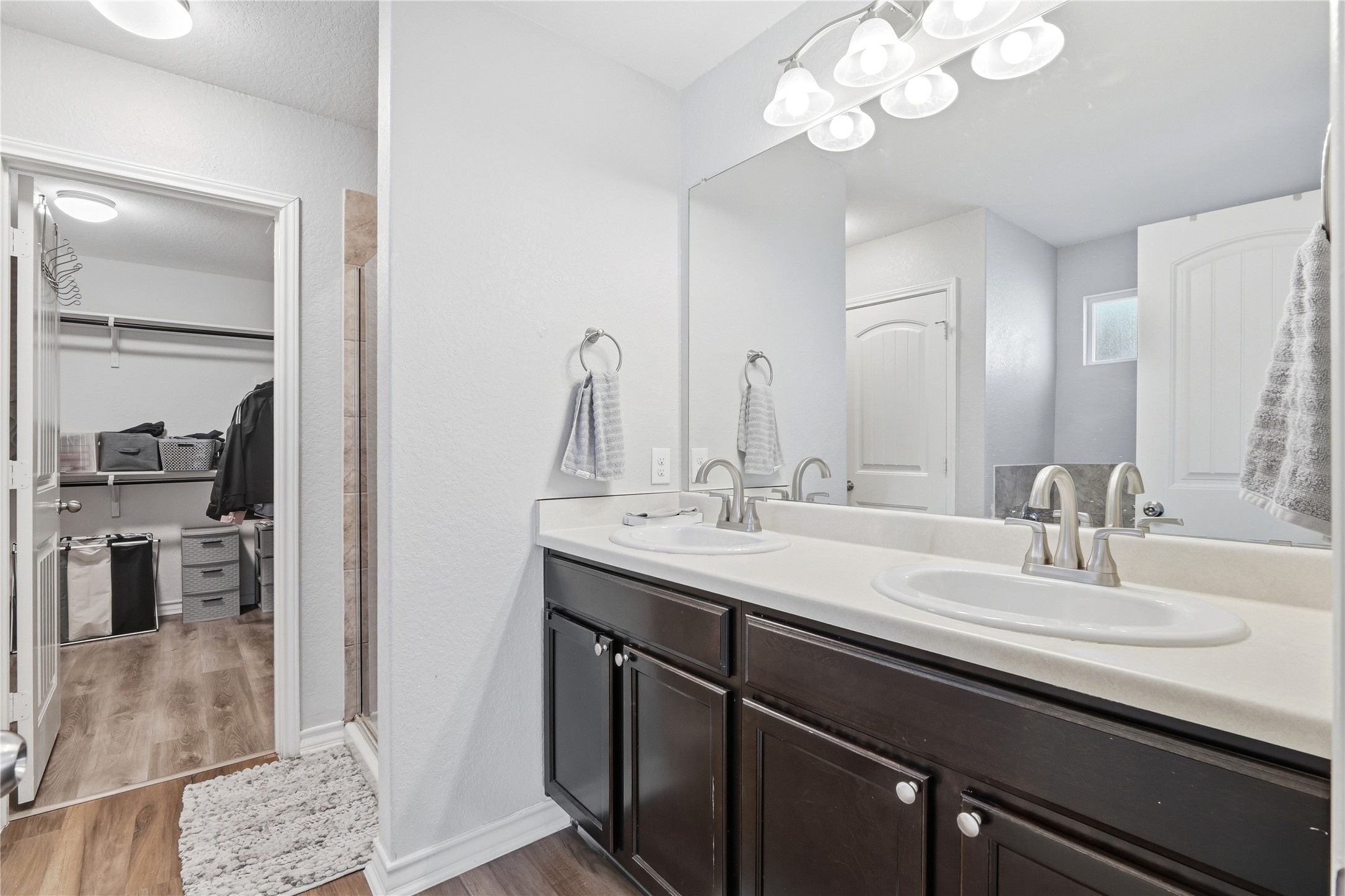 2811 Davis Trace San Antonio, TX 78245 - Photo 16 of 31 a bathroom with a sink a vanity and a mirror