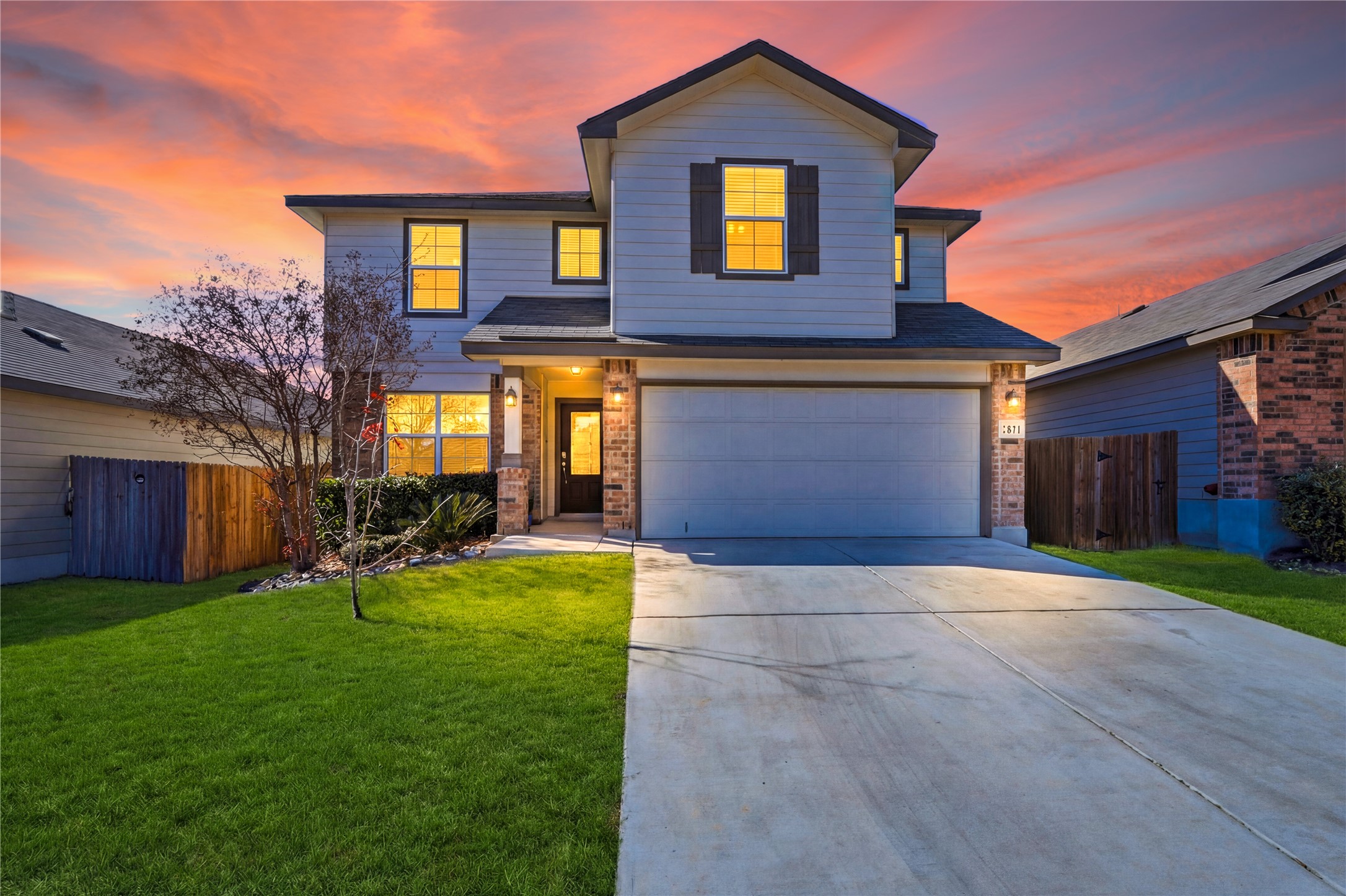 2811 Davis Trace San Antonio, TX 78245 - Photo 2 of 31 a front view of a house with yard and a tree