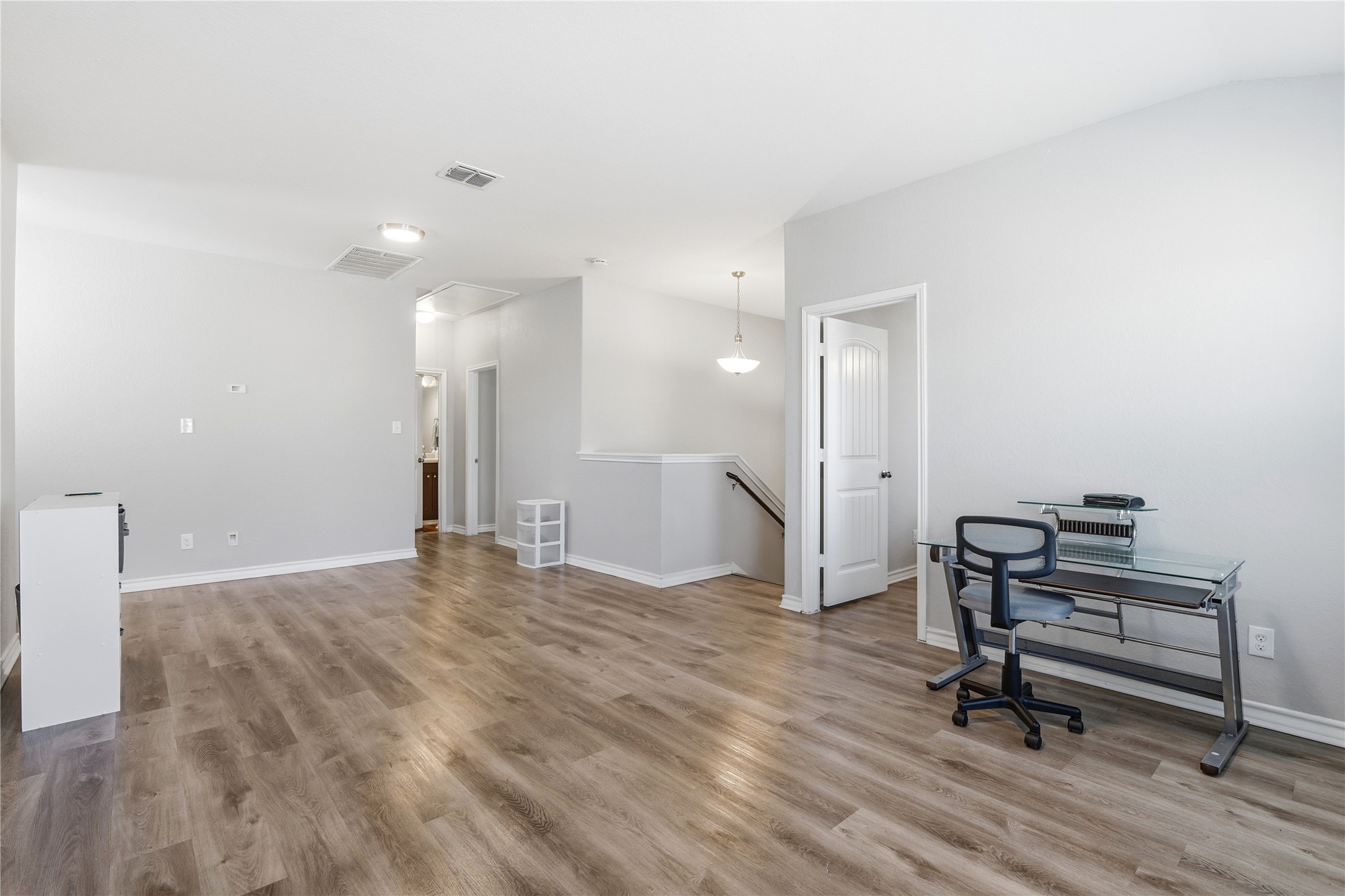 2811 Davis Trace San Antonio, TX 78245 - Photo 22 of 31 a view of a room with wooden floor and glass door