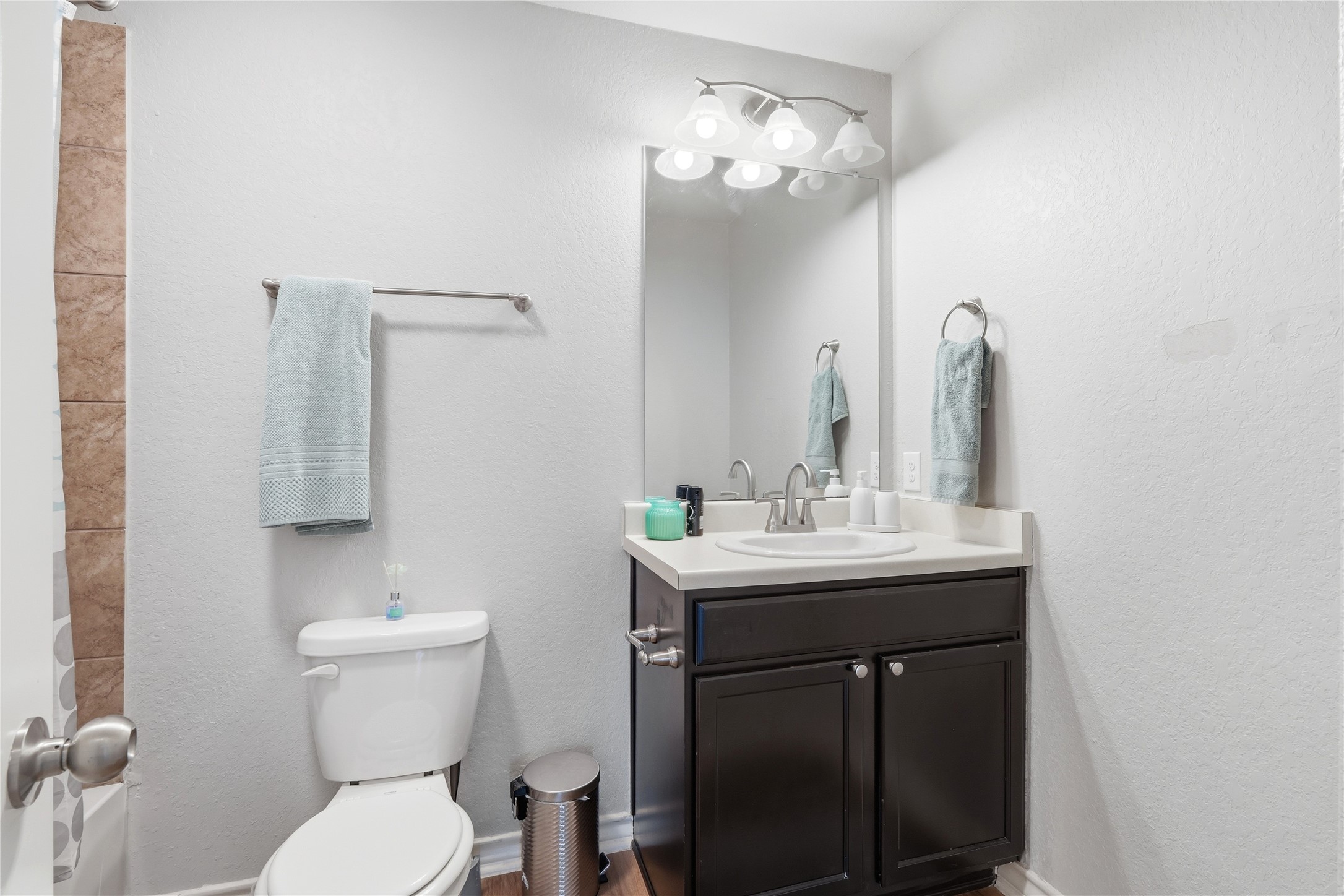 2811 Davis Trace San Antonio, TX 78245 - Photo 25 of 31 a bathroom with a toilet sink and mirror