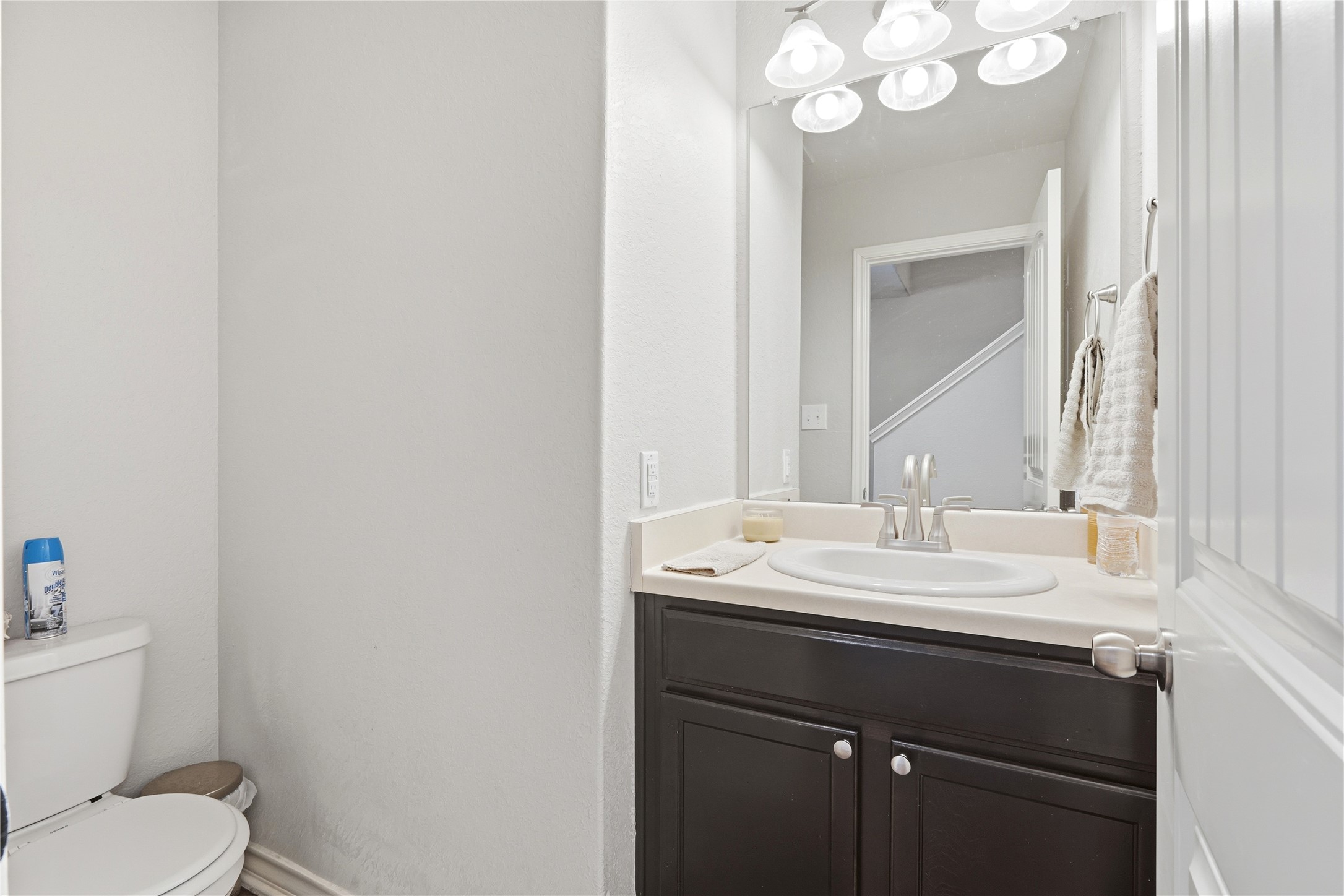 2811 Davis Trace San Antonio, TX 78245 - Photo 28 of 31 a bathroom with a sink a toilet and a mirror