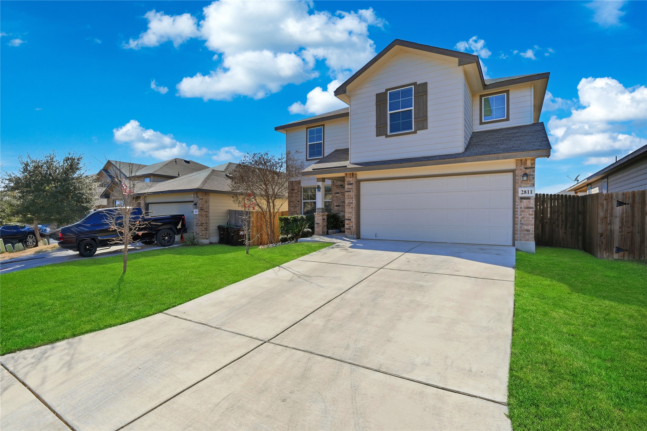 2811 Davis Trace San Antonio, TX 78245 - Photo 3 of 31 a front view of house with yard and green space