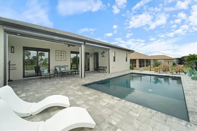 a view of a patio with a table chairs and a patio