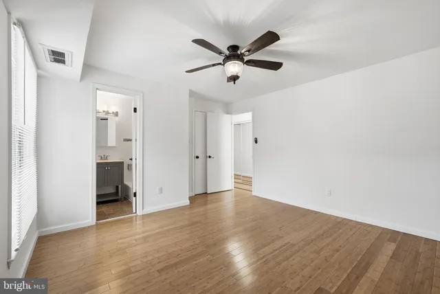 a bathroom with a sink a mirror and a bathtub