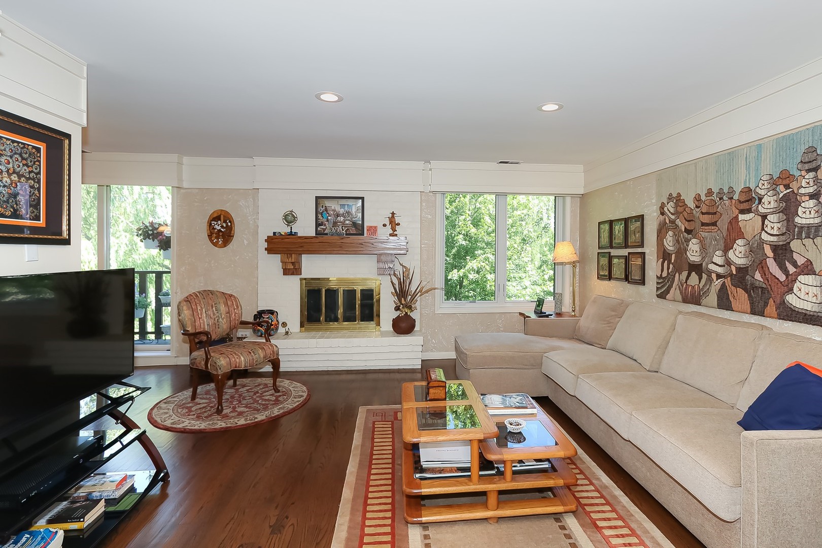 1175 Lake Cook Road, Unit 409 Northbrook, IL 60062 - Photo 13 of 27 a living room with furniture and a fireplace