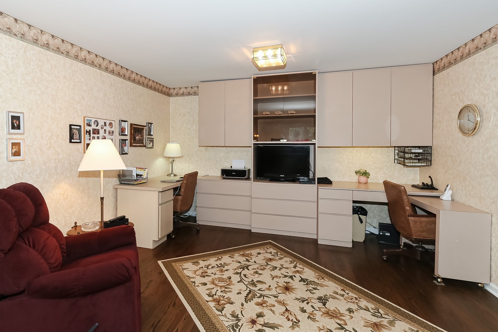 1175 Lake Cook Road, Unit 409 Northbrook, IL 60062 - Photo 16 of 27 a living room with furniture and a rug