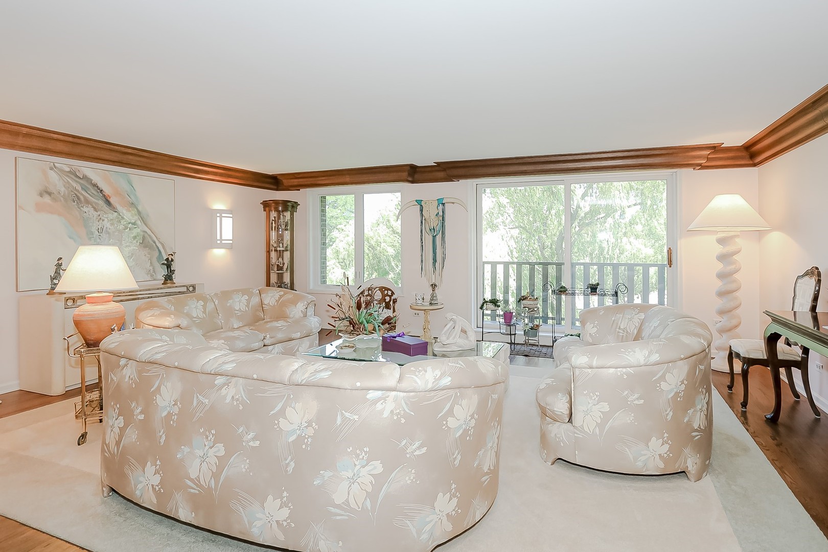 1175 Lake Cook Road, Unit 409 Northbrook, IL 60062 - Photo 4 of 27 a dining table with chairs and chandelier
