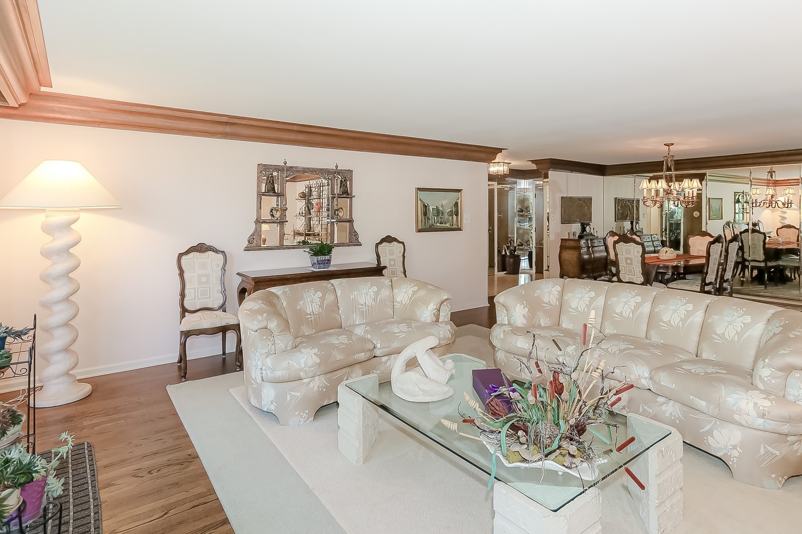 1175 Lake Cook Road, Unit 409 Northbrook, IL 60062 - Photo 6 of 27 a living room with furniture and a large window