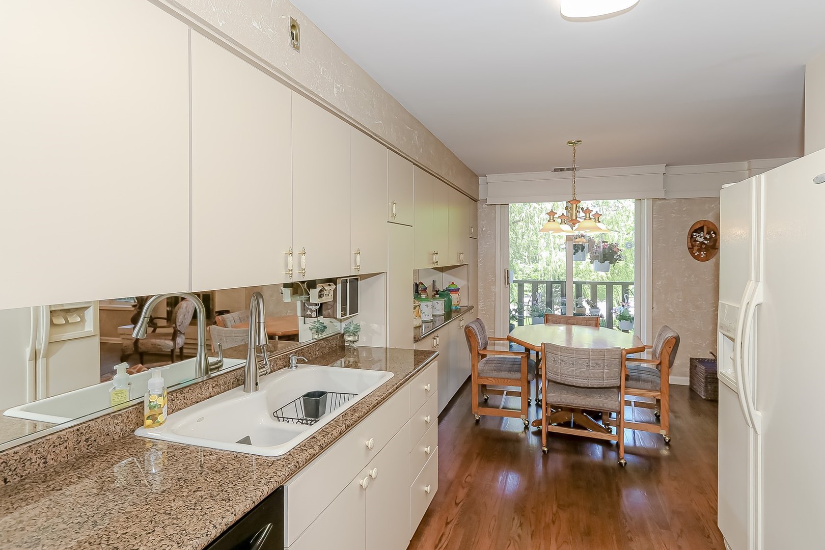1175 Lake Cook Road, Unit 409 Northbrook, IL 60062 - Photo 9 of 27 a workspace with wooden floor