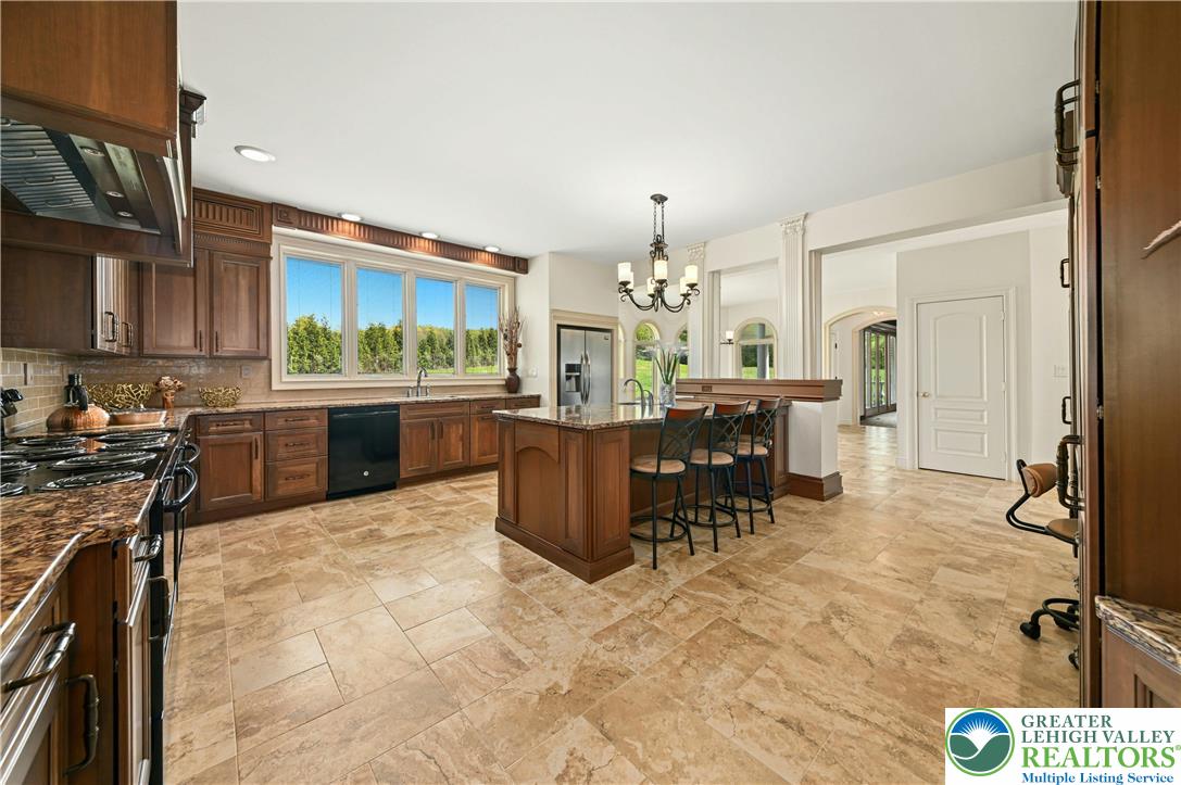 3200 Creamery Road New Hope, PA 18938 - Photo 10 of 42 a kitchen with a table and chairs