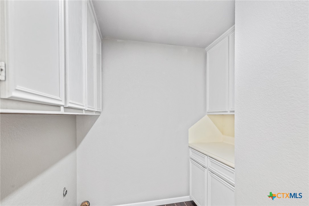 116 Newport Drive Victoria, TX 77904 - Photo 23 of 25 a utility room with dryer and washer