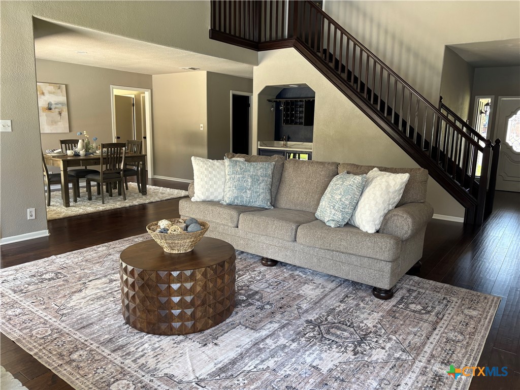 116 Newport Drive Victoria, TX 77904 - Photo 3 of 25 a living room with furniture and wooden floor