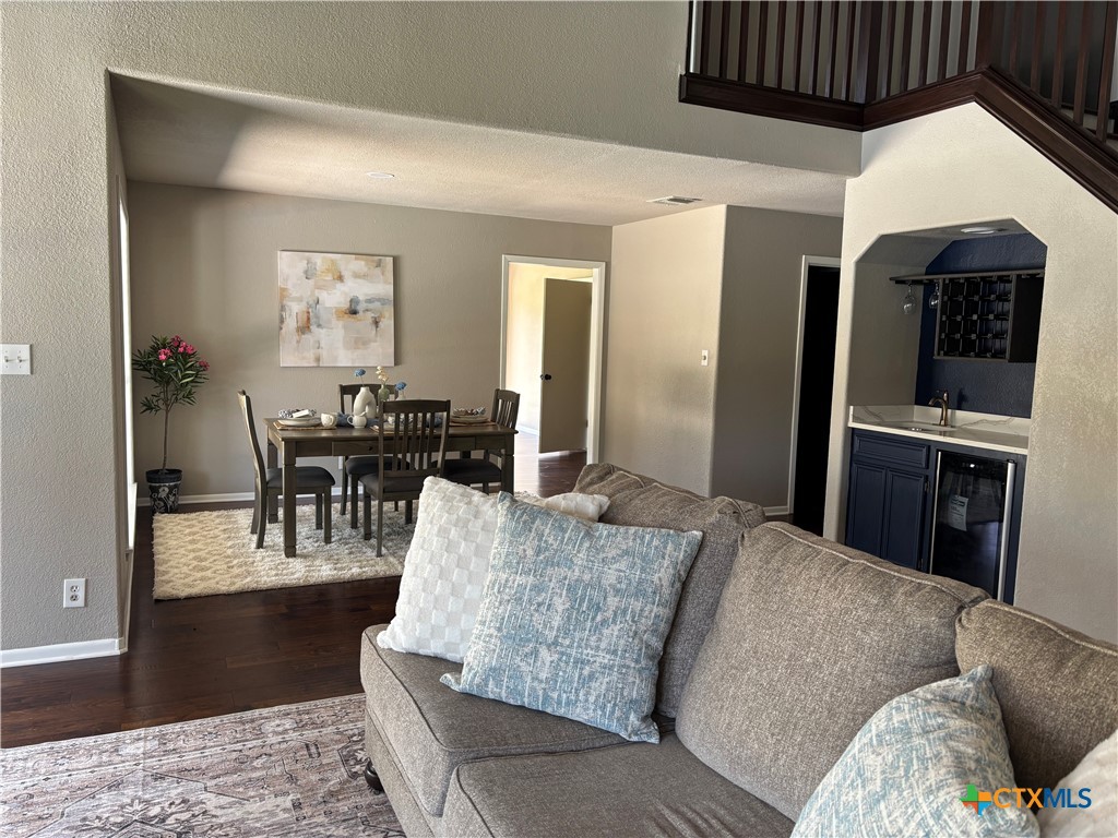 116 Newport Drive Victoria, TX 77904 - Photo 5 of 25 a living room with furniture and a rug