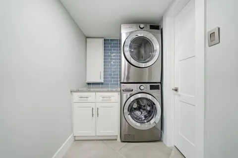 a swimming pool with outdoor seating and yard