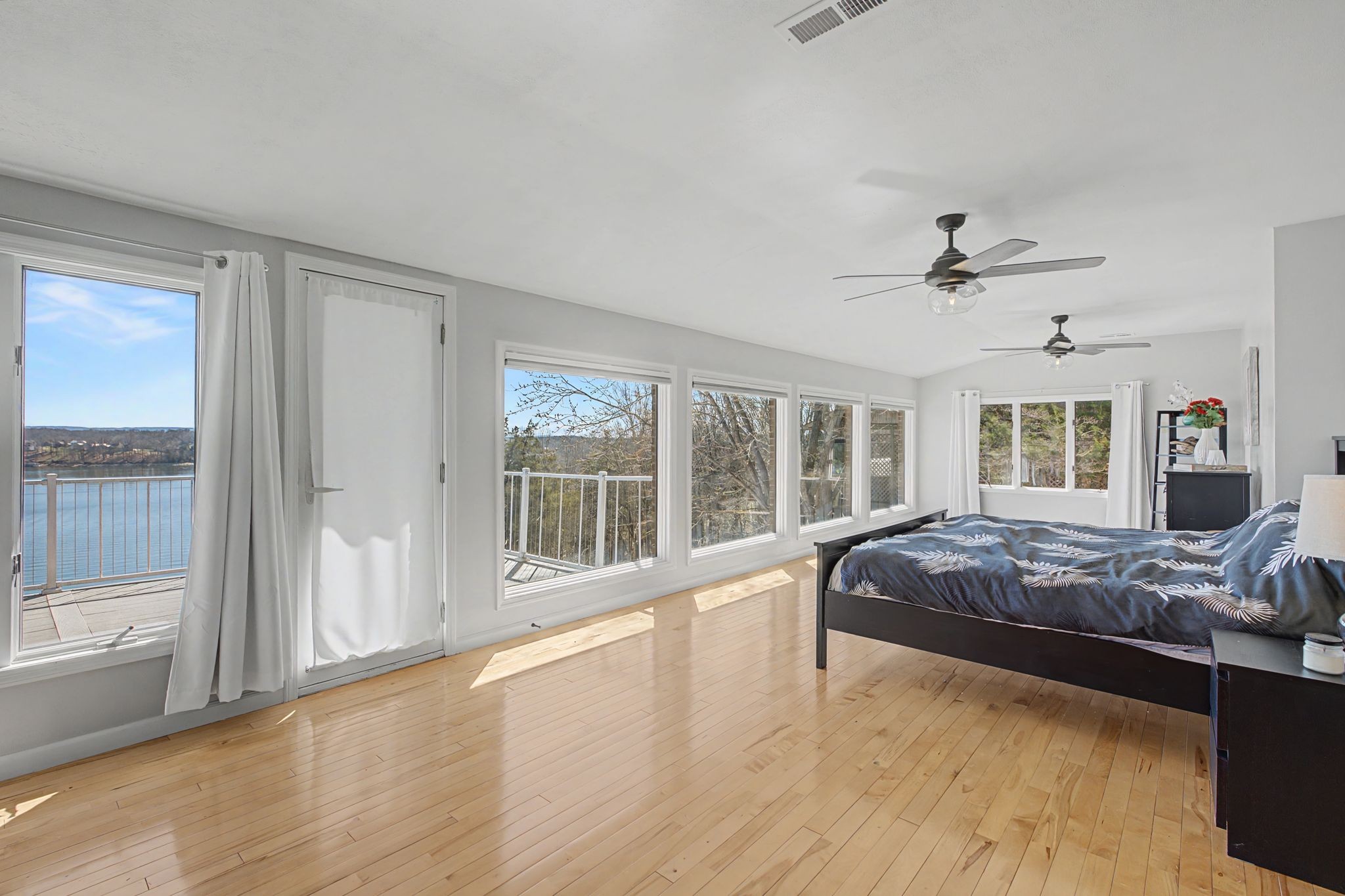 1601 Damron Road Estill Springs, TN 37330 - Photo 28 of 59 a large bedroom with a large bed and a large window