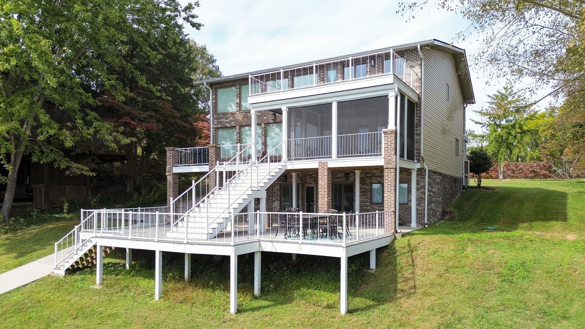 1601 Damron Road Estill Springs, TN 37330 - Photo 4 of 59 a view of a house with a yard and sitting area
