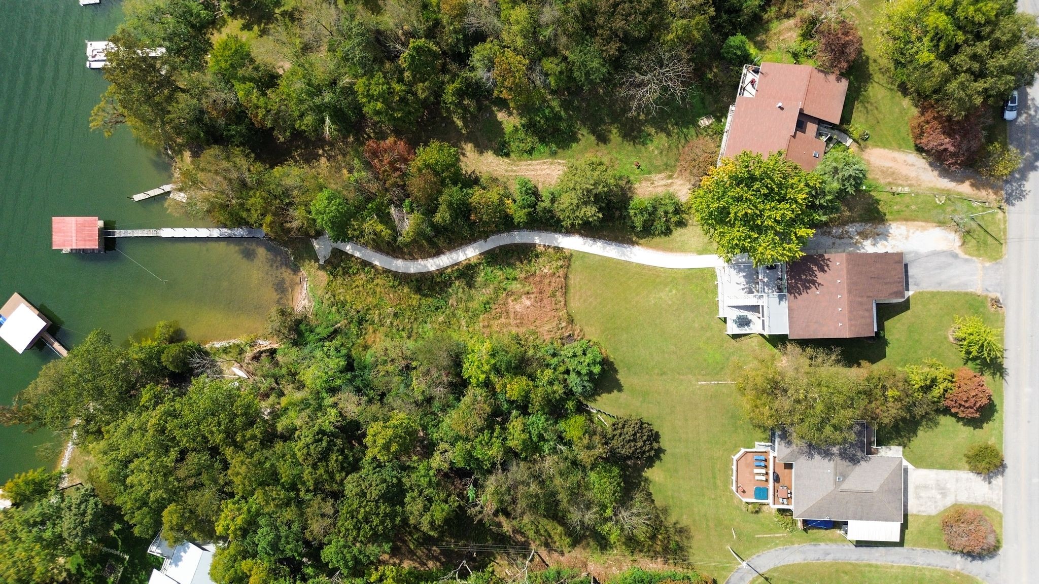 1601 Damron Road Estill Springs, TN 37330 - Photo 56 of 59 an aerial view of a house with a yard and lake view