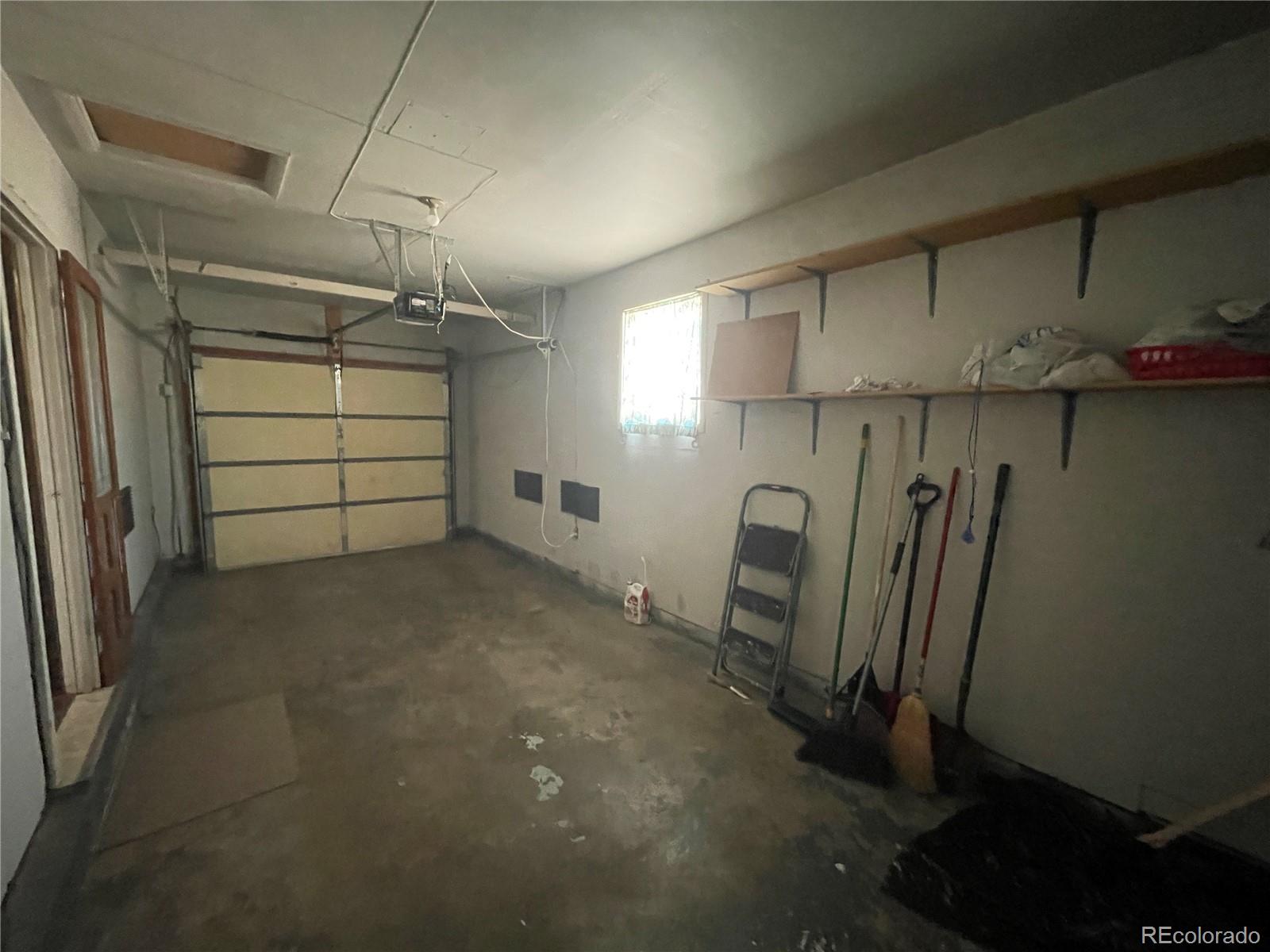 3086 Victor Street Aurora, CO 80011 - Photo 27 of 30 a view of a garage room