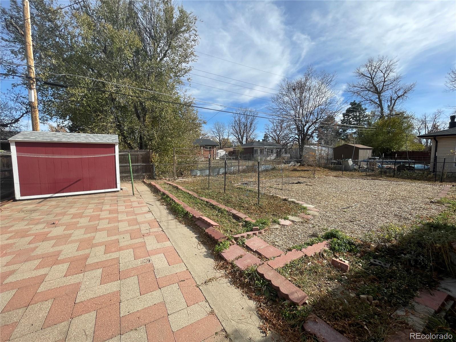 3086 Victor Street Aurora, CO 80011 - Photo 30 of 30 a view of a yard with an empty space