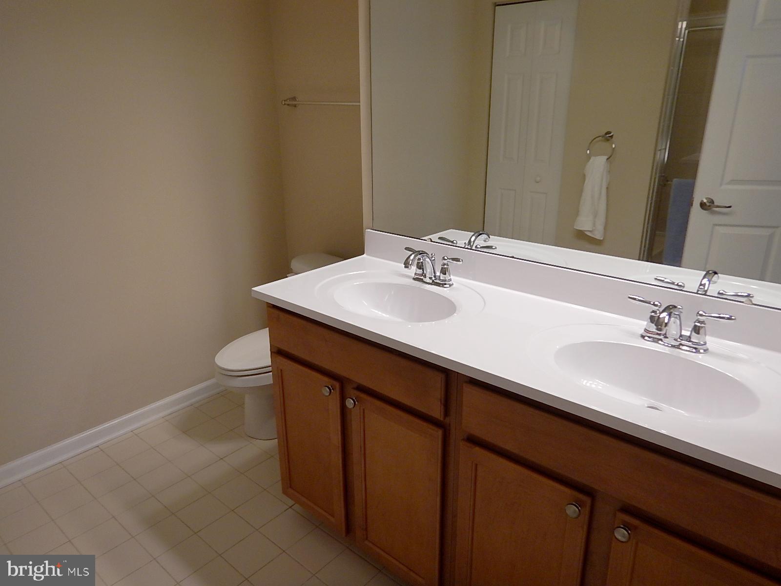 633 Wallingford Road, Unit 201 Bel Air, MD 21014 - Photo 28 of 38 Twin sinks and tile floor