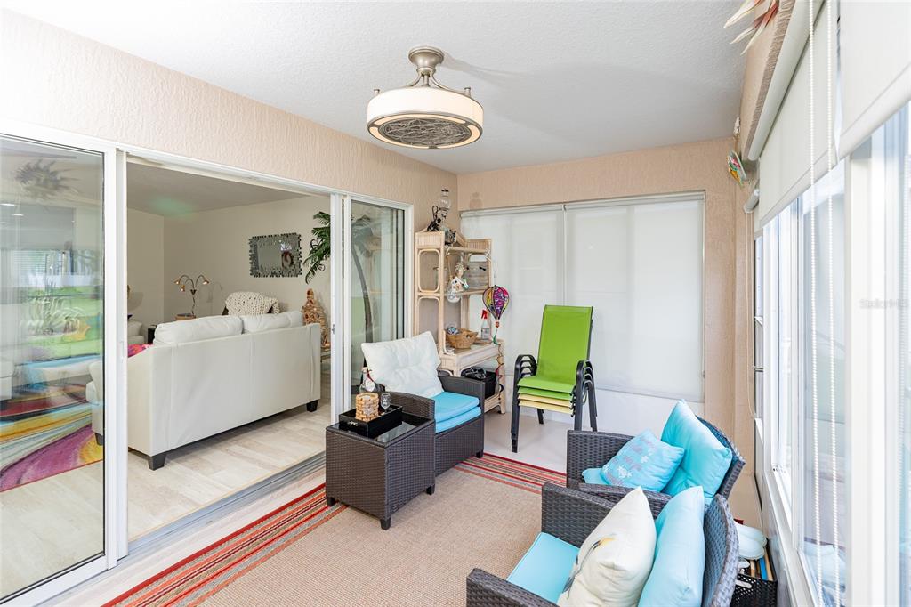 15858 Southwest 11th Court Road Ocala, FL 34473 - Photo 35 of 59 a living room with furniture and a large window