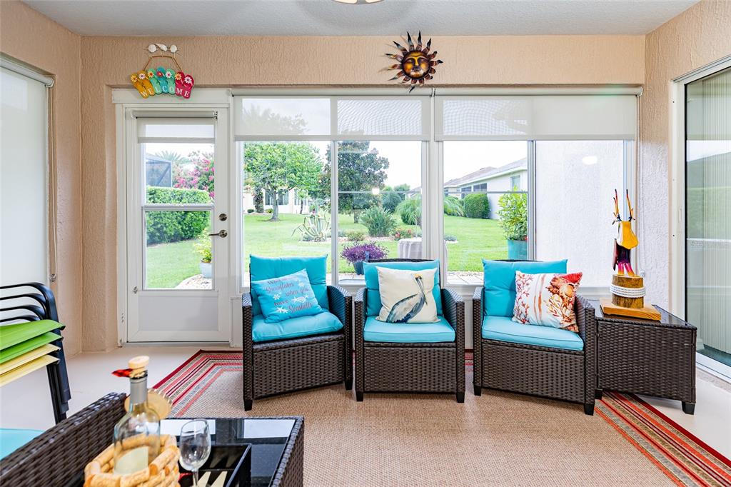15858 Southwest 11th Court Road Ocala, FL 34473 - Photo 36 of 59 a living room with furniture and a window