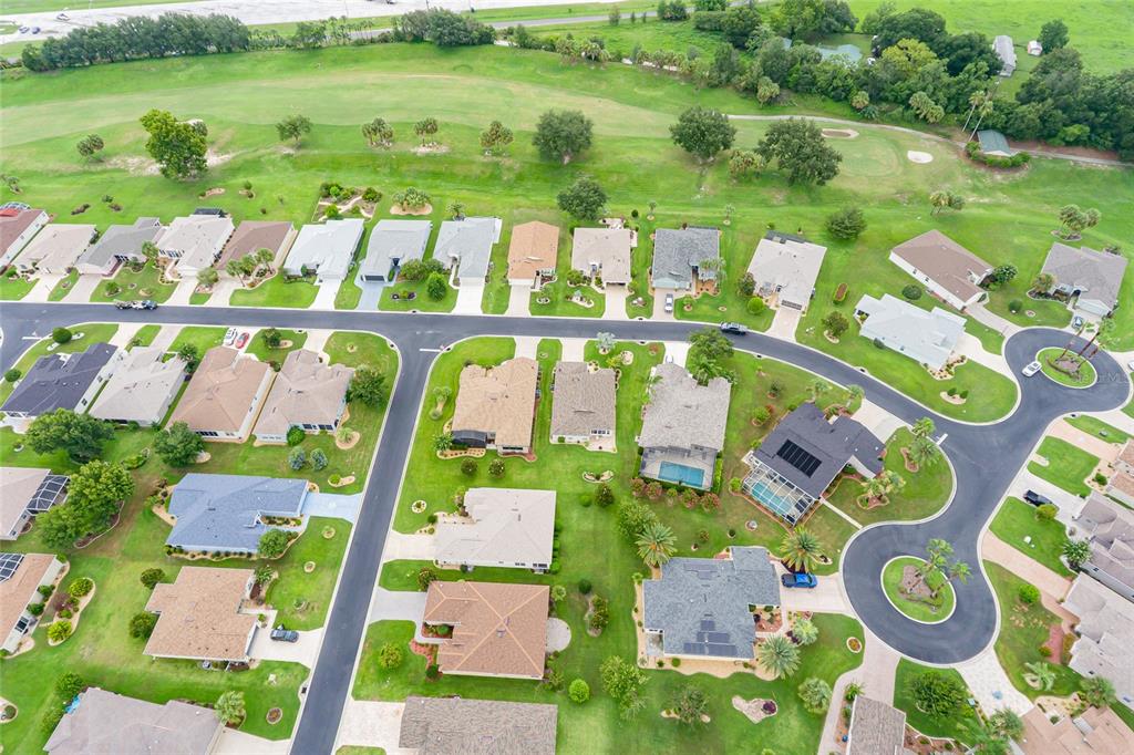 15858 Southwest 11th Court Road Ocala, FL 34473 - Photo 49 of 59 a view of swimming pool with a garden and seating area