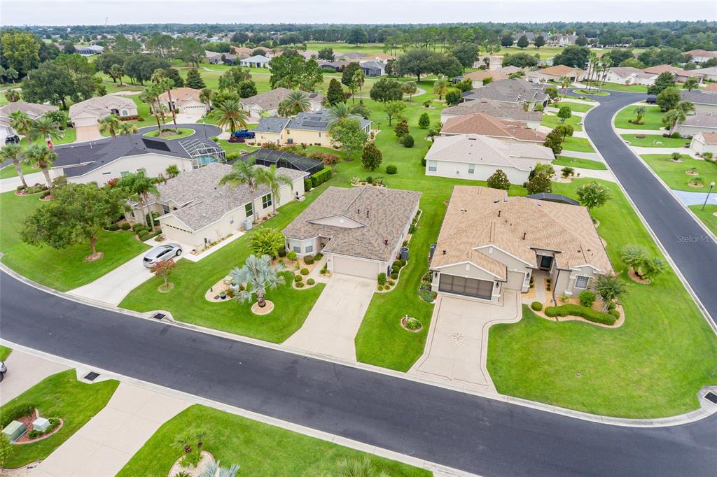 15858 Southwest 11th Court Road Ocala, FL 34473 - Photo 55 of 59 an aerial view of a house with a garden and trees