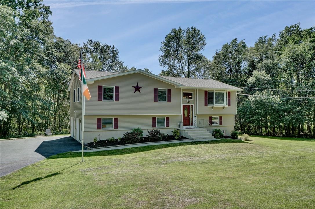 151 County Rte 22 Parish, NY 13131 - Photo 1 of 1 a front view of a house with a garden