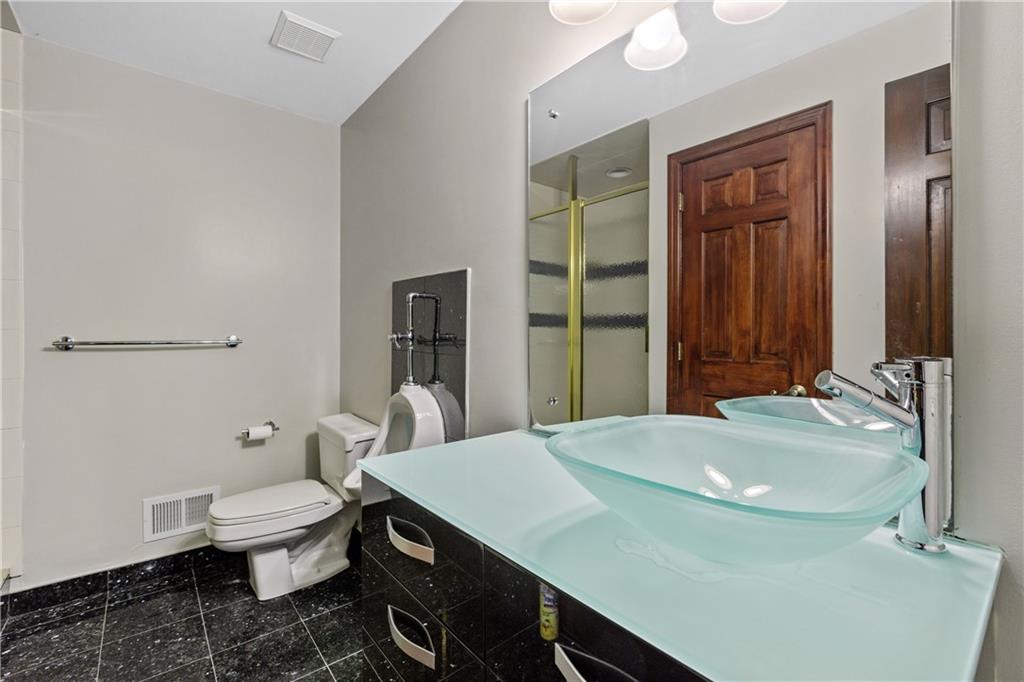 140 Countryview Drive McKees Rocks, PA 15136 - Photo 22 of 25 a bathroom with a sink a toilet and shower