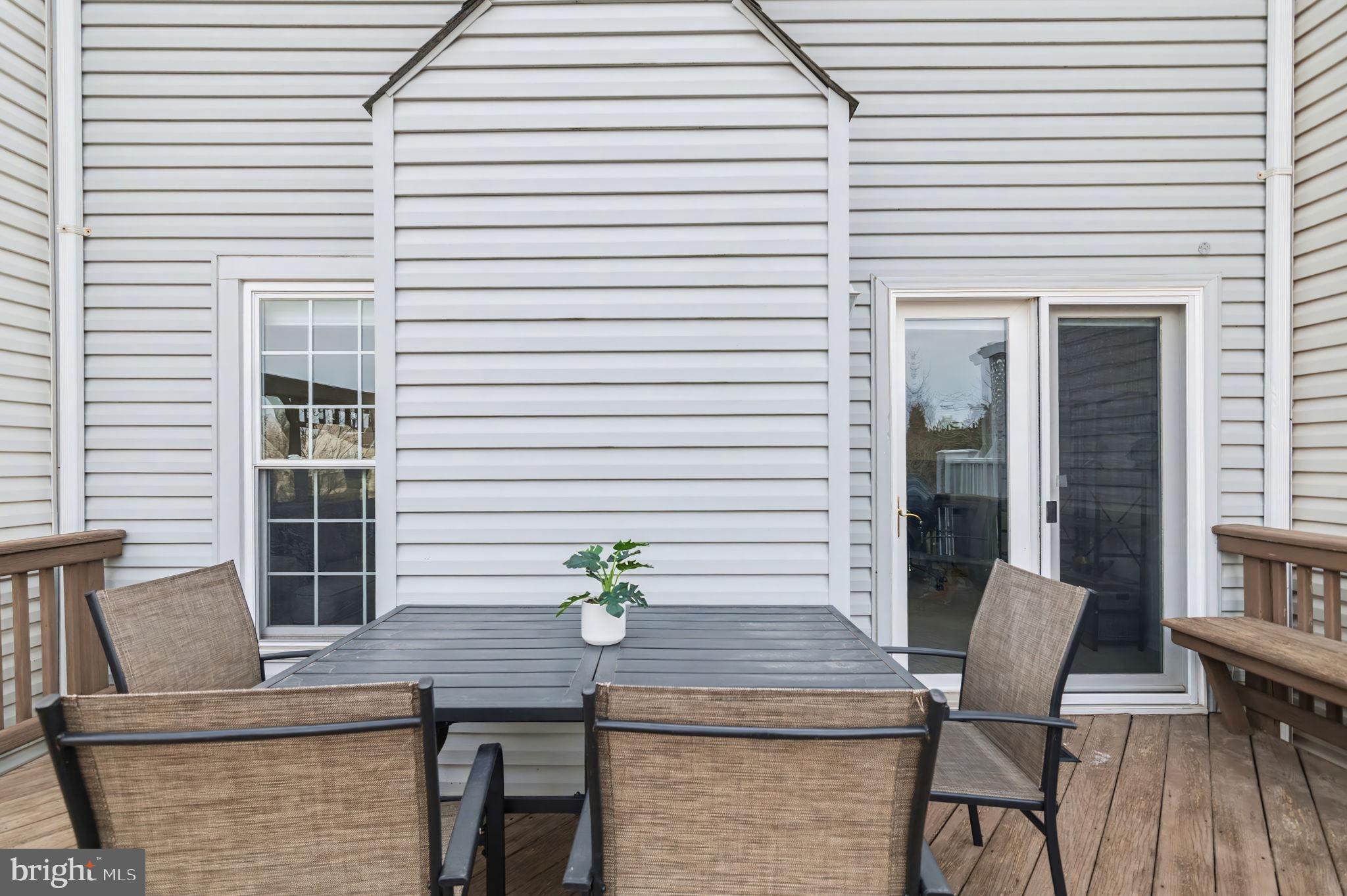 43484 Blacksmith Square Ashburn, VA 20147 - Photo 15 of 69 a view of a room with a table and chairs