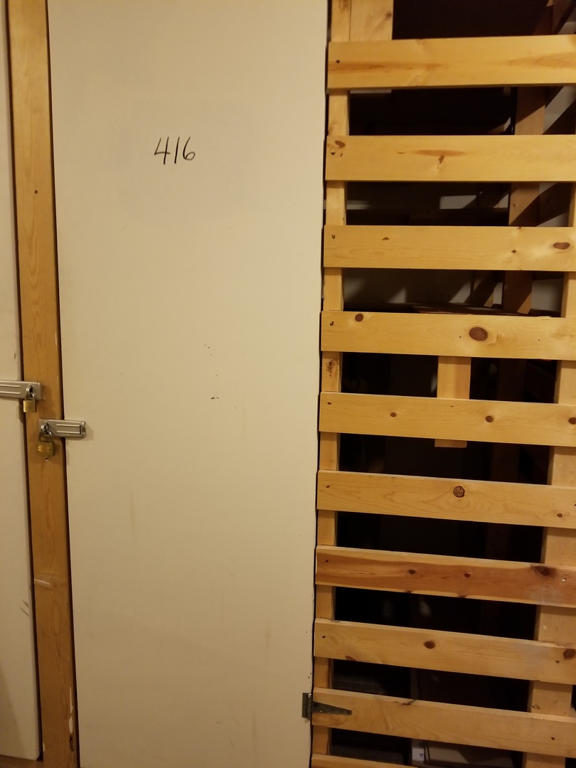 725 West Huntington Commons Road, Unit 416 Mount Prospect, IL 60056 - Photo 12 of 17 a view of walk in closet with empty racks