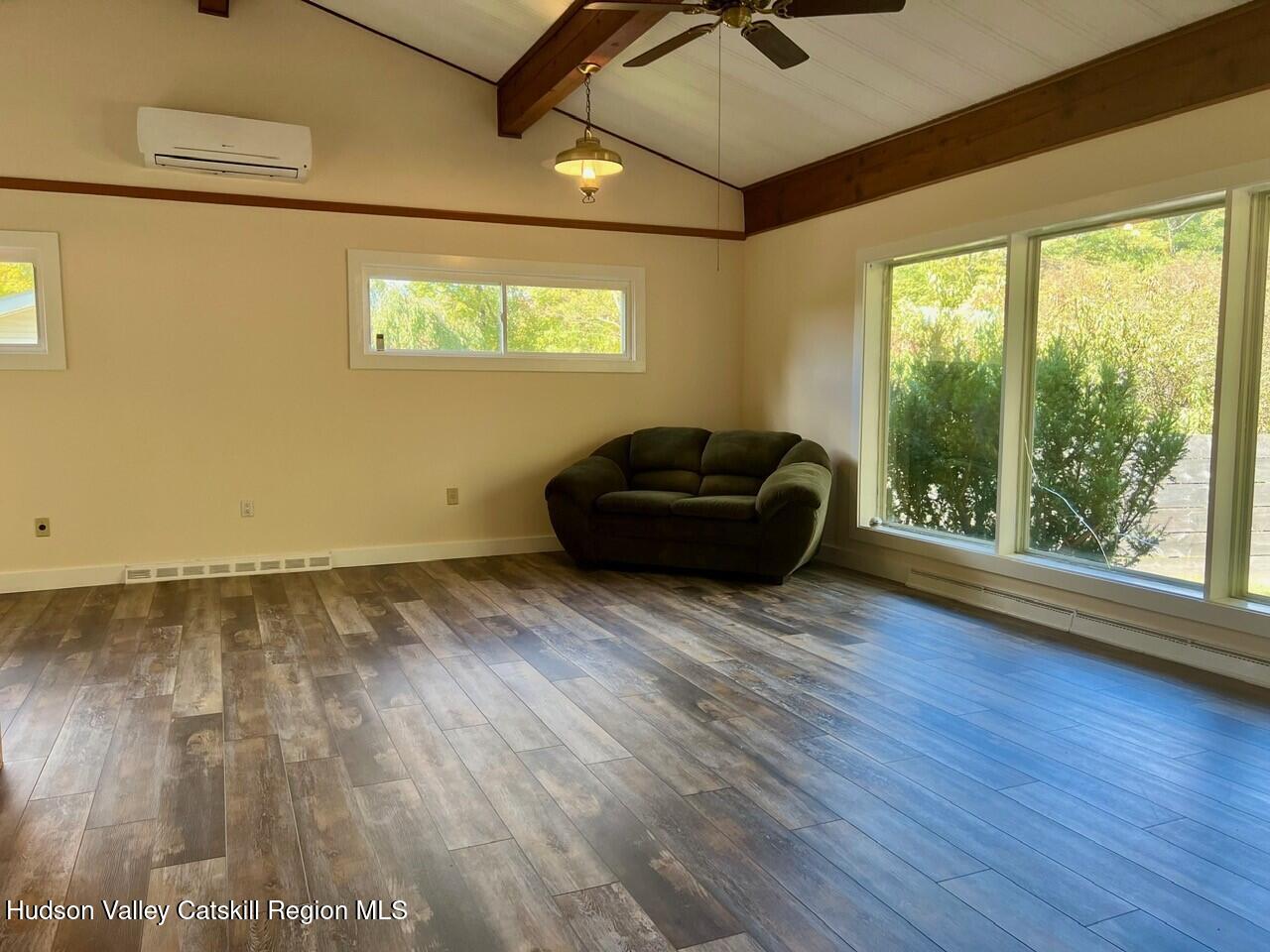 2 Shokan Park Road Shokan, NY 12481 - Photo 4 of 42 a living room with hard wood floors and a window