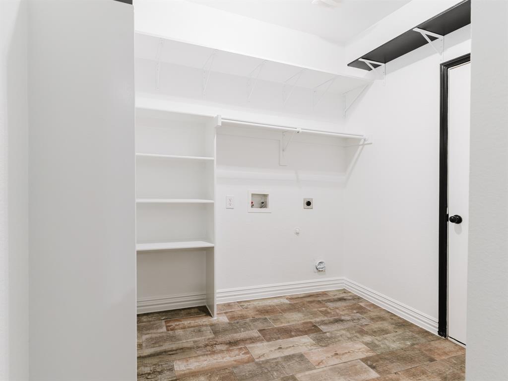 1733 Elm Street Anna, TX 75409 - Photo 24 of 25 Laundry room with washer hookup, electric dryer hookup, gas dryer hookup, and light wood-style floors