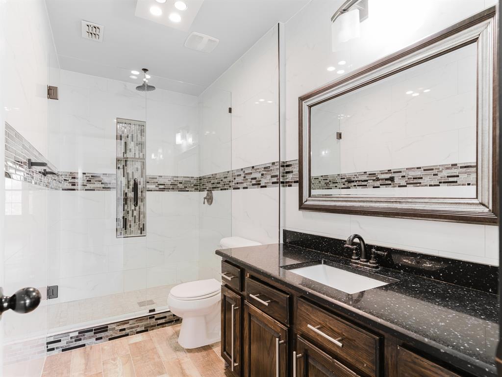 1733 Elm Street Anna, TX 75409 - Photo 10 of 25 Full bathroom featuring vanity and a marble finish shower