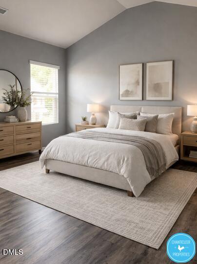 8960 Commons Townes Drive Raleigh, NC 27616 - Photo 8 of 13 a bedroom with a bed and window