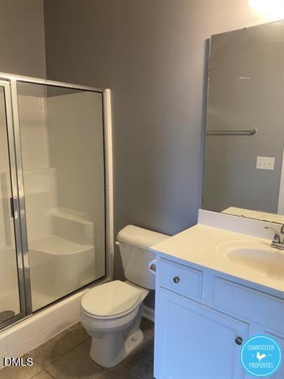 8960 Commons Townes Drive Raleigh, NC 27616 - Photo 10 of 13 a bathroom with a toilet and a shower