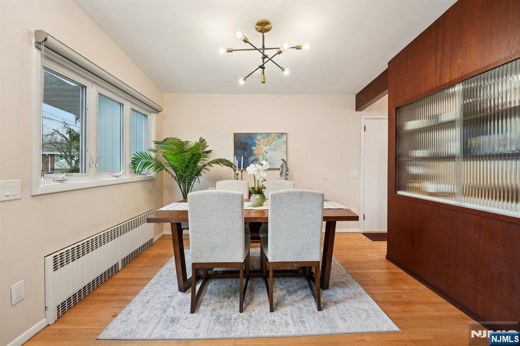 208 Prospect Avenue Oradell, NJ 07649 - Photo 12 of 50 a view of a dining room with furniture window and wooden floor