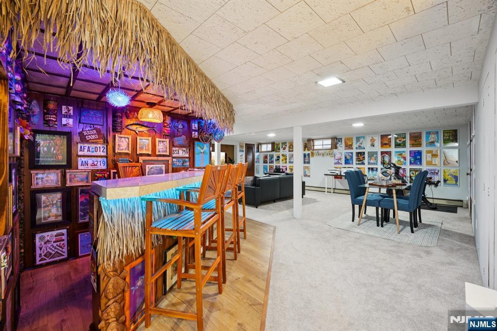 208 Prospect Avenue Oradell, NJ 07649 - Photo 28 of 50 a dining area with stainless steel appliances lots of white furniture