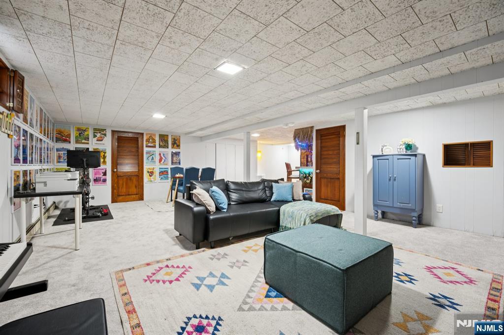 208 Prospect Avenue Oradell, NJ 07649 - Photo 31 of 50 a living room with furniture and a couch