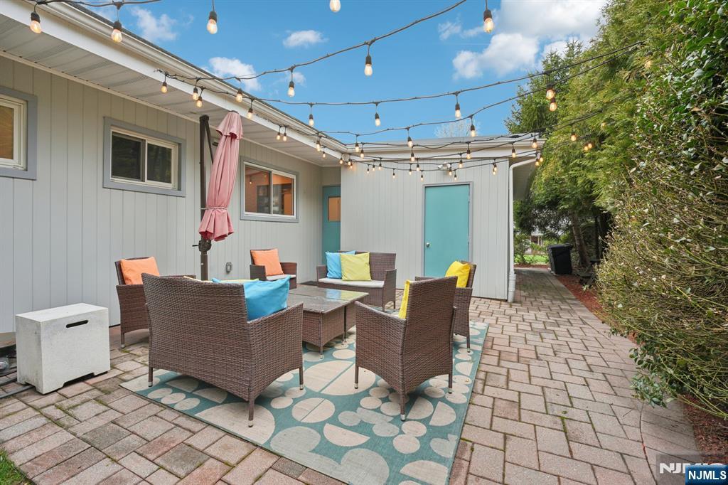 208 Prospect Avenue Oradell, NJ 07649 - Photo 41 of 50 a outdoor living space with furniture and a potted plant