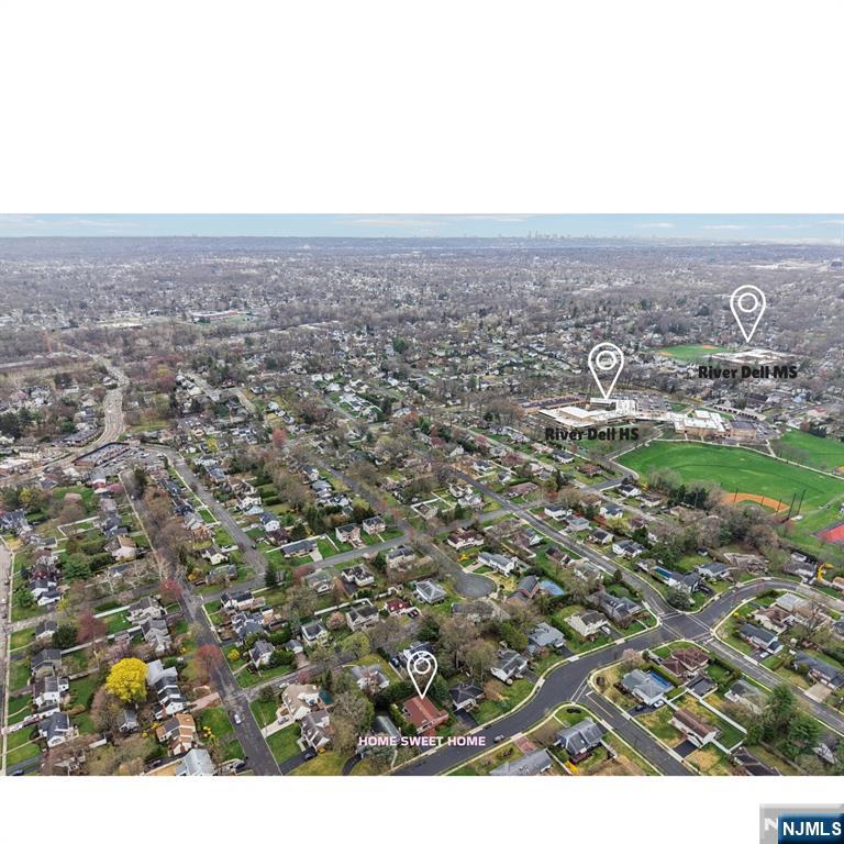 208 Prospect Avenue Oradell, NJ 07649 - Photo 46 of 50 an aerial view of house with yard and mountain view in back