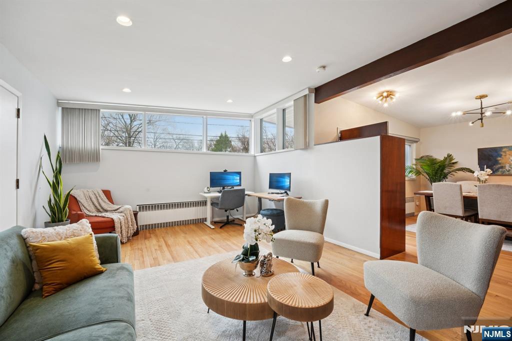 208 Prospect Avenue Oradell, NJ 07649 - Photo 8 of 50 a living room with furniture and kitchen view