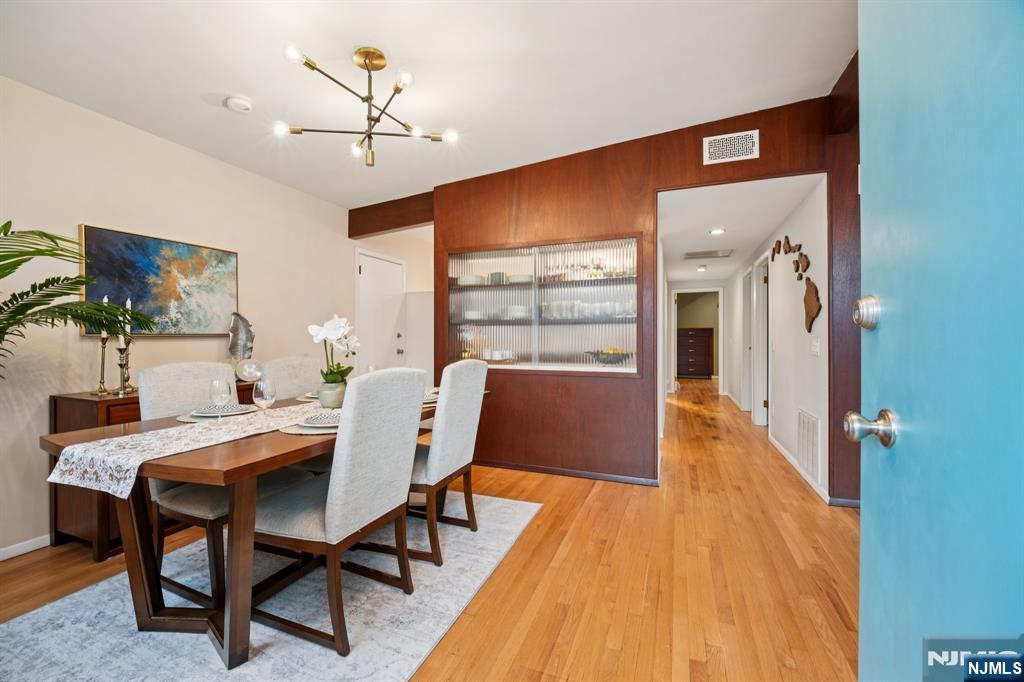 208 Prospect Avenue Oradell, NJ 07649 - Photo 10 of 50 a dining room with furniture and wooden floor